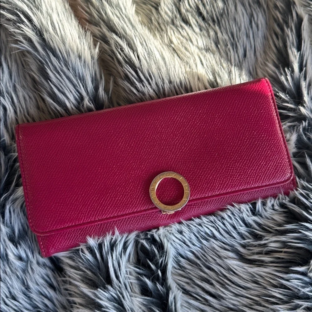 BVLGARI Clip Leather Long Bifold pink with purple interior Wallet.